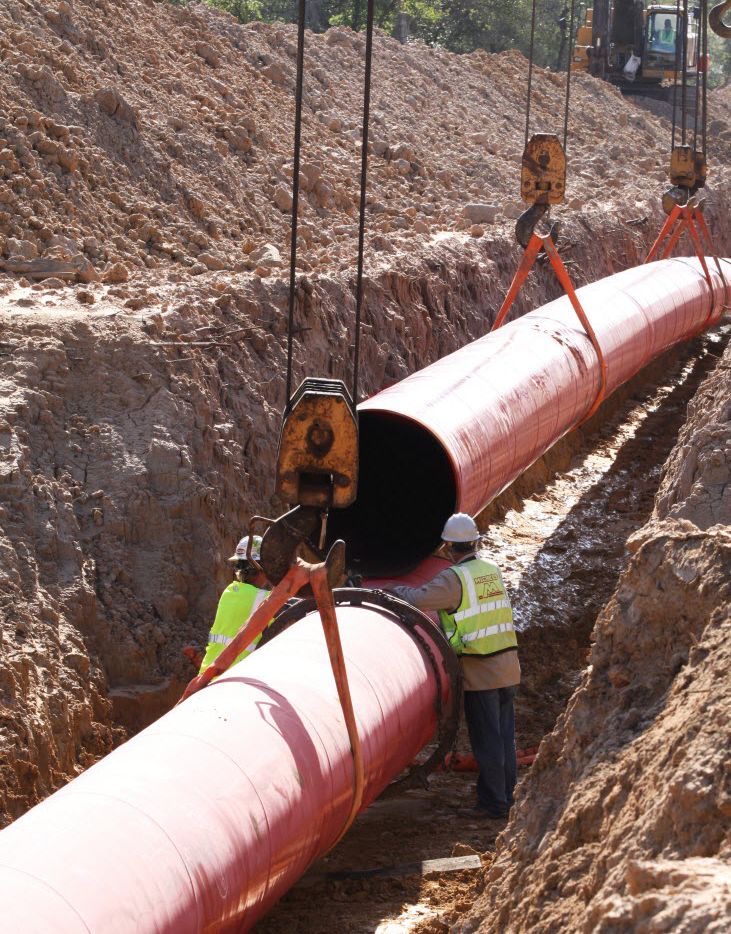 Pipeline construction in desert terrain